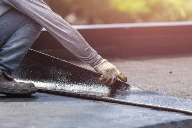 Professional Emergency Waterproofing technician working in South Pittsburg, TN